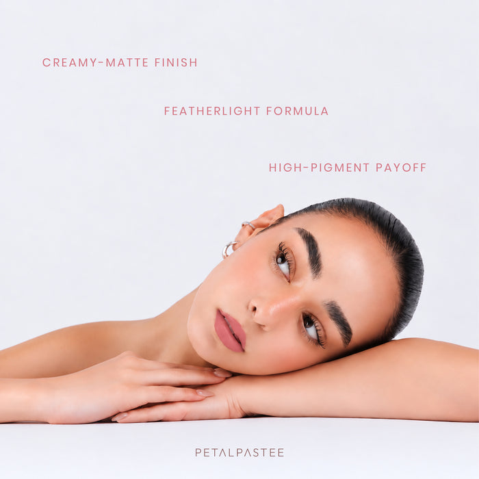 Model wearing Petal Perfection crayon lipstick: creamy-matte finish, featherlight formula, high-pigment payoff
