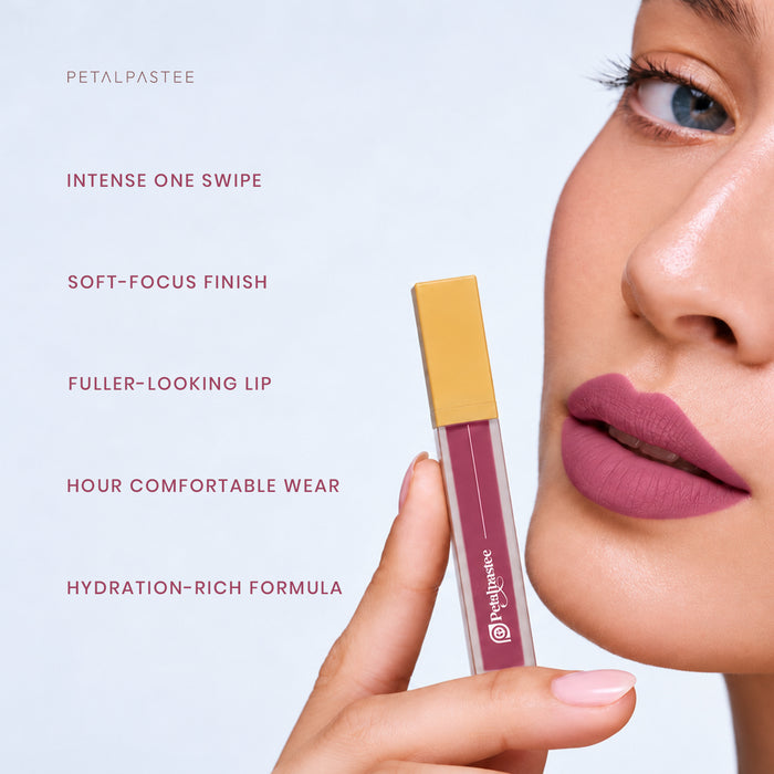 Model holding Crimson Luxe Envy Pink: intense one swipe, soft-focus finish, fuller-looking lip, comfortable wear, hydration-rich formula