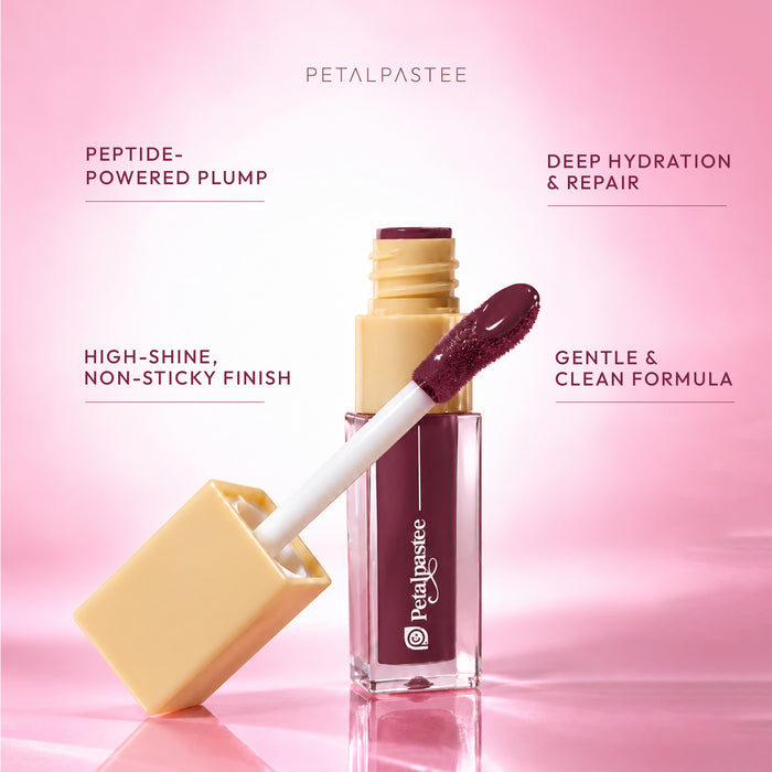 Glow Kiss Berry Cascade open tube with applicator: peptide-powered plump, deep hydration and repair, high-shine non-sticky finish, gentle and clean formula