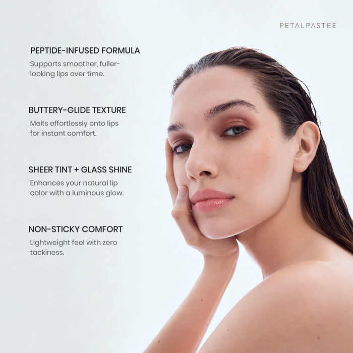 Model wearing Glow Kiss Berry Cascade: peptide-infused formula, buttery-glide texture, sheer tint with glass shine, non-sticky comfort