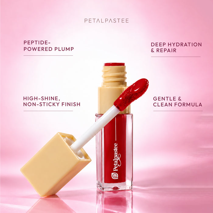 Glow Kiss Fire Glint open tube with applicator: peptide-powered plump, deep hydration and repair, high-shine non-sticky finish, gentle and clean formula