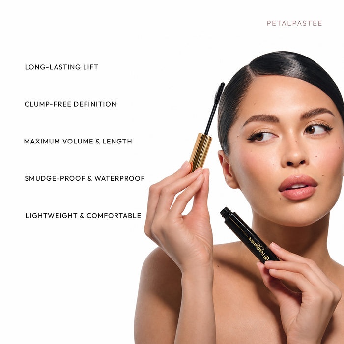 Model holding Wink It mascara wand: long-lasting lift, clump-free definition, volume and length, smudge-proof and waterproof
