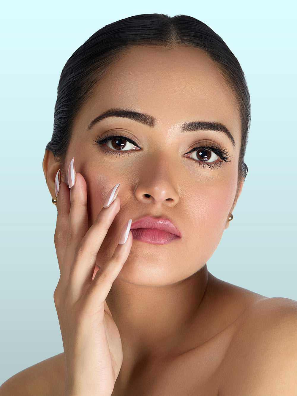 Model wearing Wink It mascara for a natural defined lash look